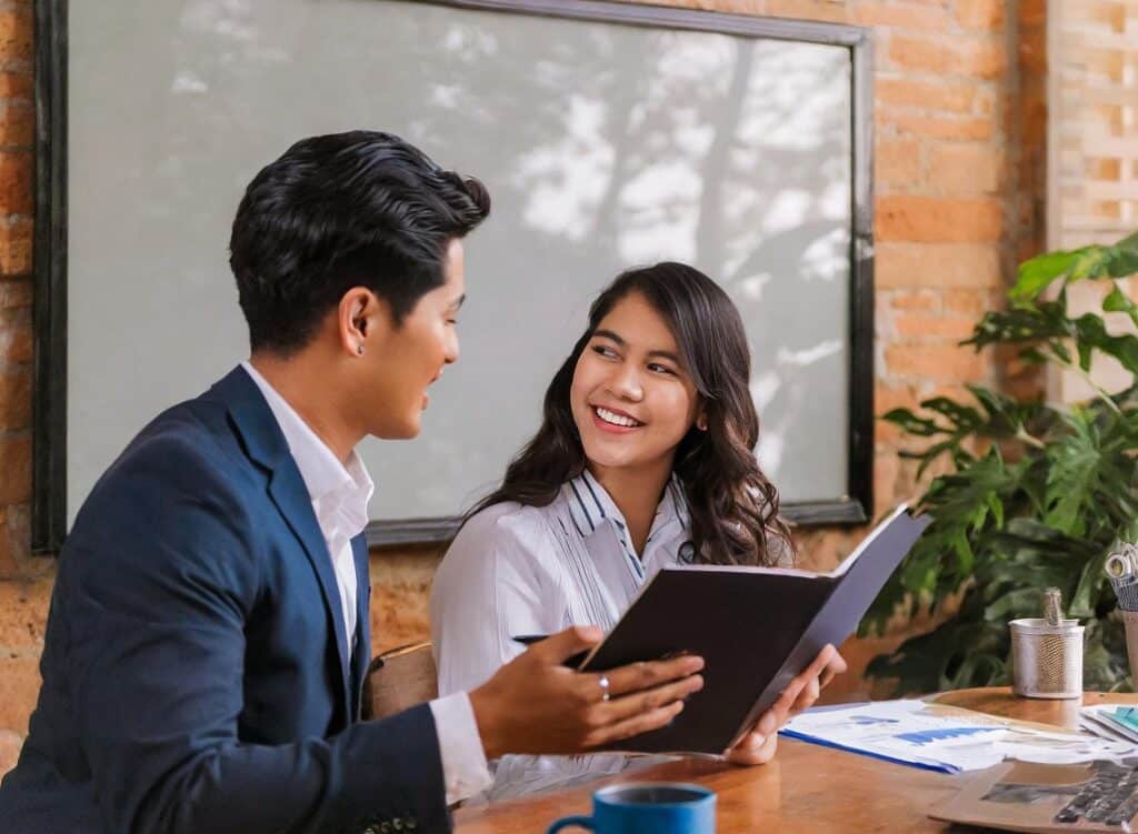 A professional boy and girl in a business meeting